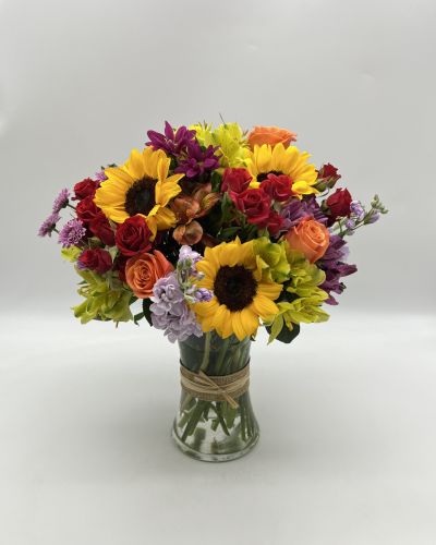 <p data-start="82" data-end="383">Celebrate their special day with a bouquet as stunning as they are. <em data-start="150" data-end="167">Birthday Beauty</em> captures the joy and warmth of a birthday celebration, making every moment feel brighter and more memorable. Sending this radiant arrangement is the perfect way to show you care and make their day truly exceptional.</p>
<p data-start="385" data-end="692">This elegant bouquet features cheerful sunflowers and classic roses, complemented by a variety of fresh seasonal blooms and lush greenery. All expertly arranged in a clear glass vase that adds a timeless touch. The mix of golden yellows and soft reds creates a vibrant, sunny display full of life and charm.</p>
<p data-start="694" data-end="904">Ideal for birthdays or any joyful occasion, <em data-start="738" data-end="755">Birthday Beauty</em> brings warmth and happiness to the recipient’s home. It’s a thoughtful gift that expresses celebration, love, and heartfelt wishes with every bloom.</p>
<p data-start="906" data-end="1085">Available for prompt local delivery in Boca Raton, Rosa’s La Hacienda ensures every bouquet is carefully crafted and delivered with care. Trust us to make your gift unforgettable.</p>
<p data-start="1087" data-end="1165" data-is-last-node="" data-is-only-node="">Make their birthday shine bright with this beautiful floral arrangement today.</p>