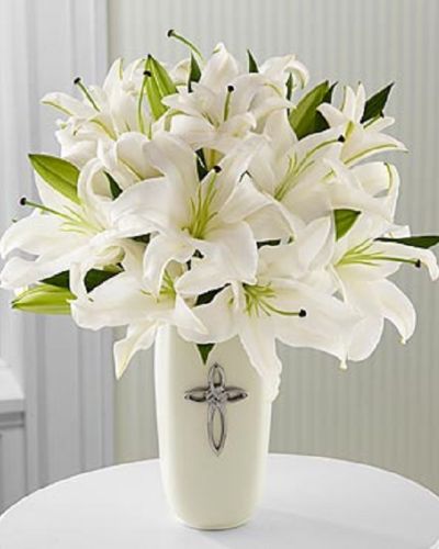 <p data-start="129" data-end="469">When words fall short, Faithful Blessings offers a serene and meaningful way to express your heart. This elegant all-white arrangement is a symbol of purity, peace, and enduring love—perfect for honoring life’s sacred moments or comforting someone during a time of reflection.</p>
<p data-start="471" data-end="734">Featuring radiant white lilies, this bouquet is arranged in a white ceramic vase and accented with a decorative cross, adding a spiritual touch to its graceful presence. The design is all-around, making it ideal for placing on a table, altar, or memorial display.</p>
<p data-start="736" data-end="994">Faithful Blessings is a fitting choice for religious celebrations, confirmations, sympathy tributes, weddings, or special anniversaries. Its clean lines and symbolic elements create a timeless and respectful presentation for life’s most meaningful occasions.</p>
<p data-start="996" data-end="1260">Every arrangement is handcrafted by the floral designers at Rosa’s La Hacienda, your trusted florist in Boca Raton. We offer same-day flower delivery throughout Boca Raton and the surrounding communities, with each bouquet arranged locally and delivered with care.</p>
<p data-start="1262" data-end="1482">Want to personalize your delivery? Add a heartfelt message during checkout to accompany this graceful tribute. With Faithful Blessings, you're sending more than flowers—you’re sharing faith, comfort, and timeless beauty.</p>
<p data-start="1484" data-end="1583">Order today from Rosa’s La Hacienda and offer a gesture of peace and grace that will be remembered.</p>